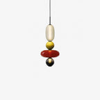 Group of glass jar pendant lights in varied silhouettes