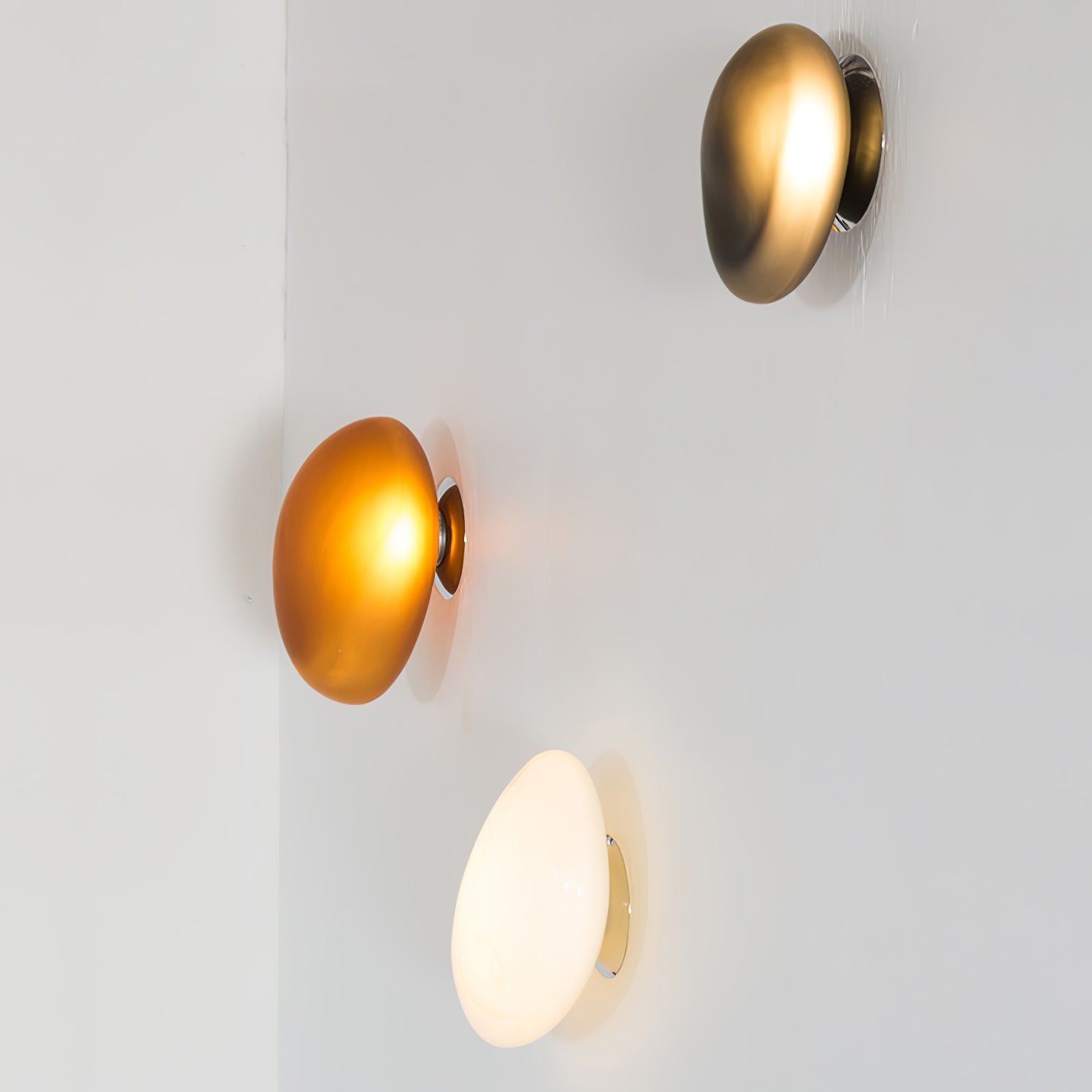 Translucent glass wall lamp glowing in a calm interior