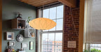 Nelson Bubble Swag Pendant Light cluster in a living room