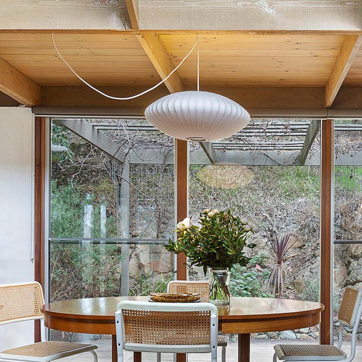 Nelson Bubble Swag Pendant Light grouped at varying heights