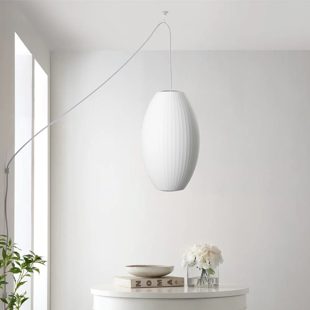 Nelson Bubble Swag Pendant Light wireframe glowing in a dim space