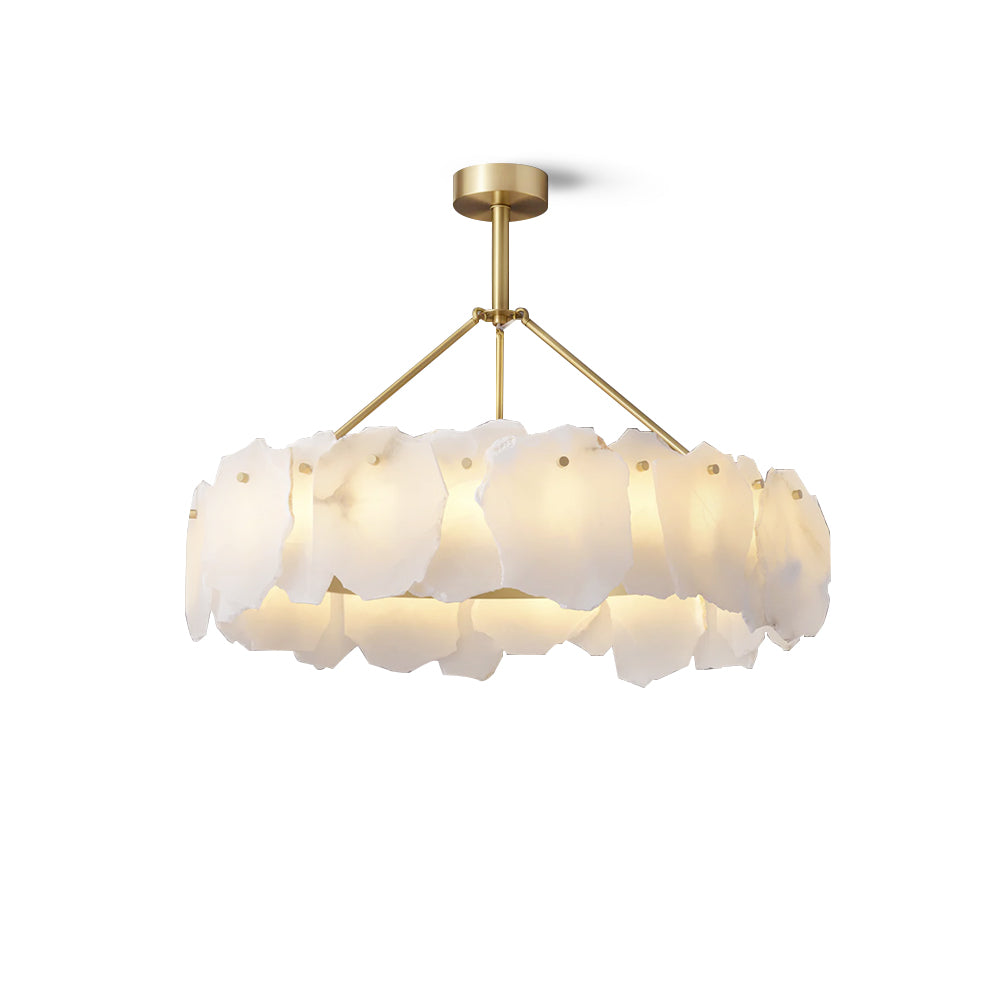 Burton round chandelier at a slight angle, warm light spilling between overlapping stone plates