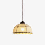 On a plain white backdrop, this Clérachic pendant shows its quilted beige shade and braided rope trim in full profile.