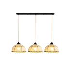 Three of these Clérachic pendants hang from one linear plate, their quilted shades and rope trim shown against white.