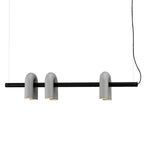 Cirkus chandelier U-heads glowing in a contemporary setting