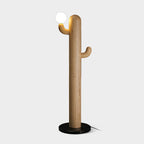 Pale-wood Clérachic floor lamp shown lit on a light grey studio background, isolated with no cord visible.