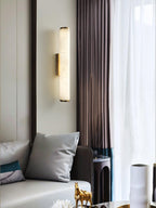 Alabaster wall sconce detail highlighting the stone shade grain