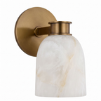 Close view of this Clérachic wall sconce in brass finish, showing the metal arm that holds its alabaster shade.