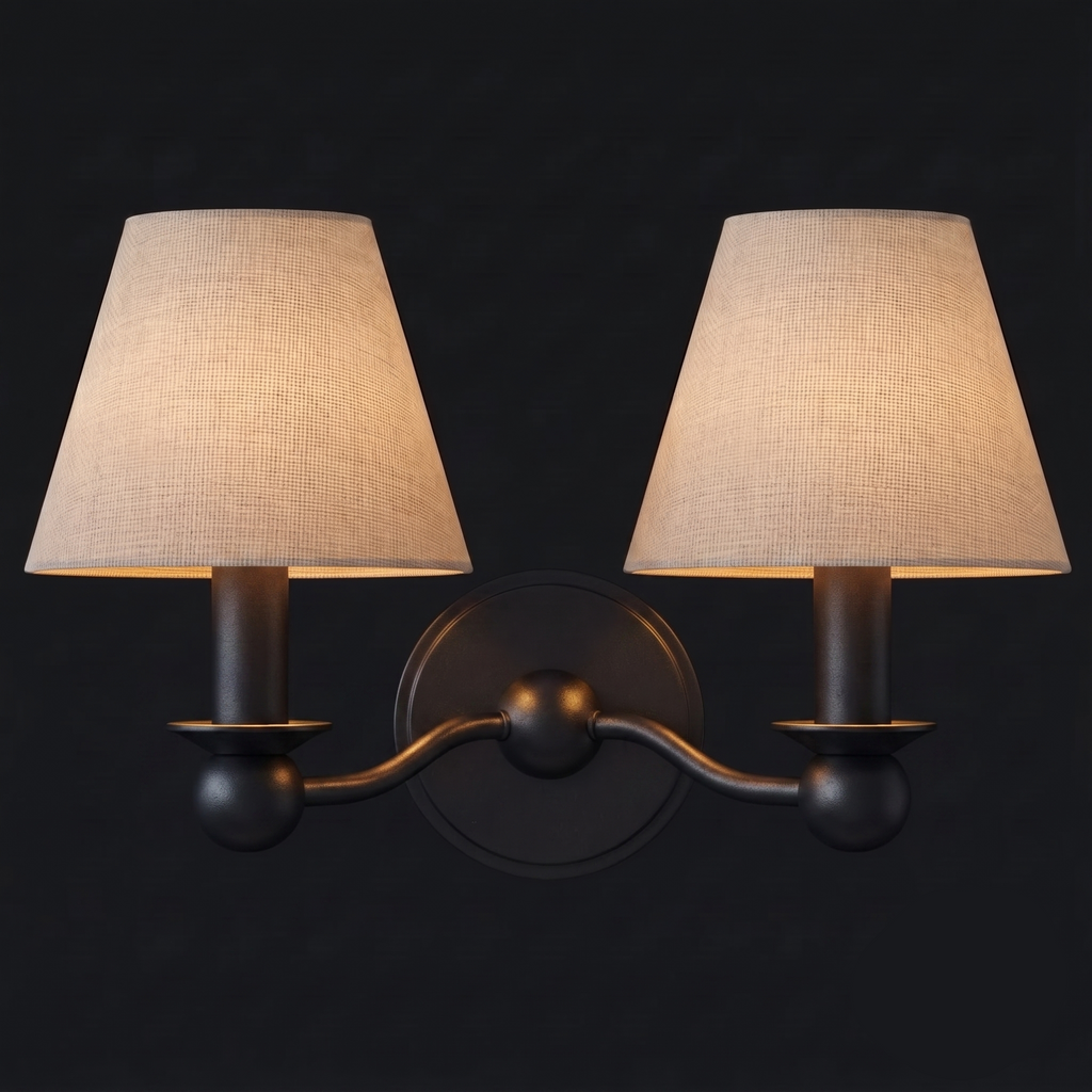 Unlit and shown in matte black, this Clérachic wall sconce stands out against a dark background.