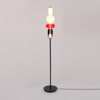 Detail of crystal glass clusters on a slim black floor lamp