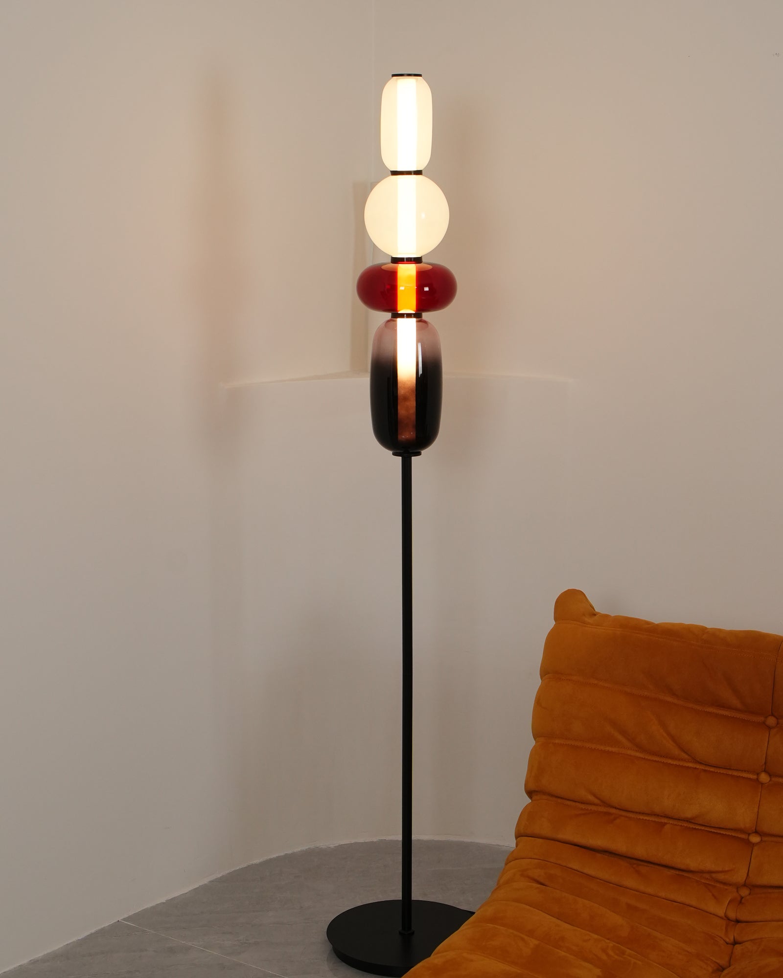 Crystal glass floor lamp detail with warm internal glow