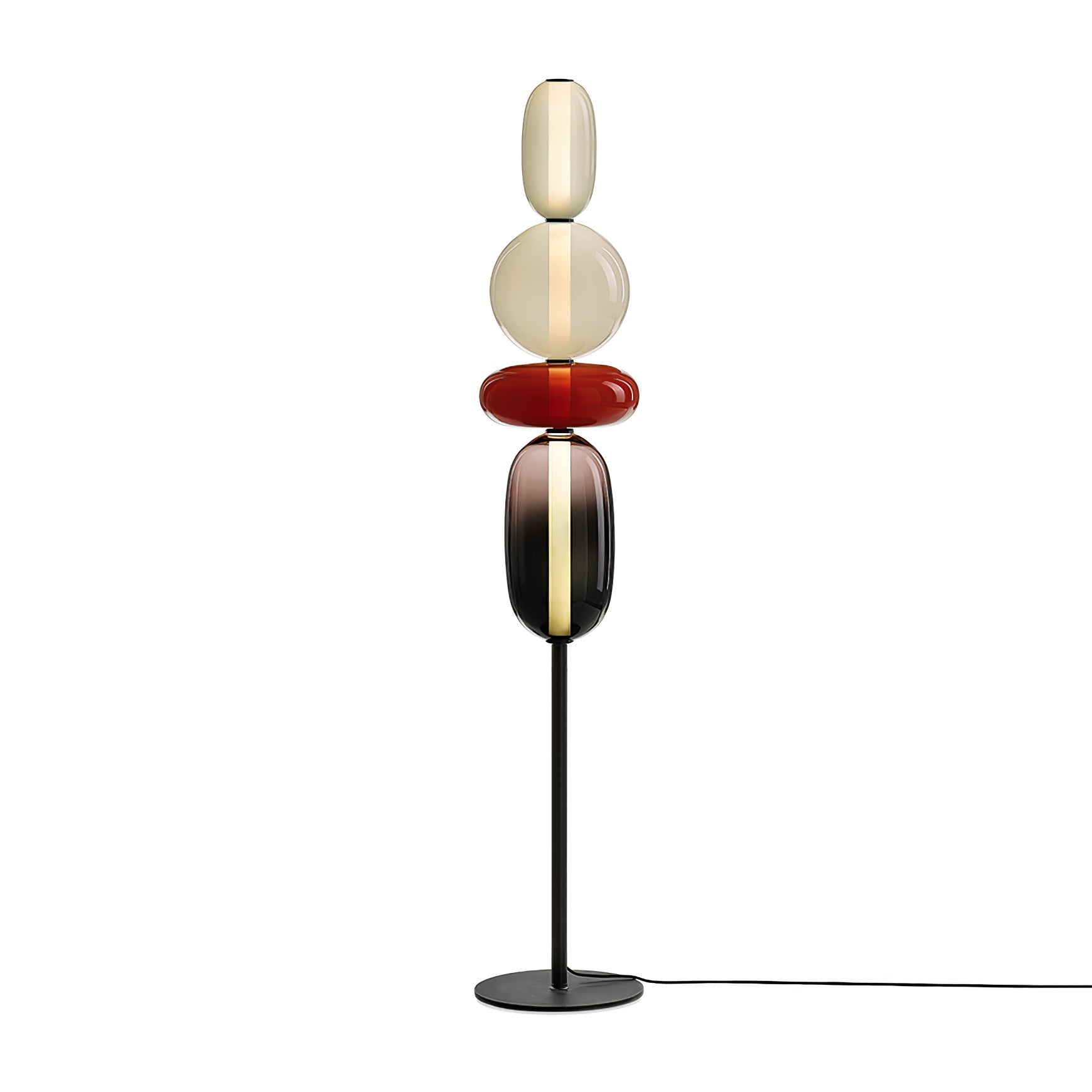 Crystal cluster floor lamp on a black post beside a sofa