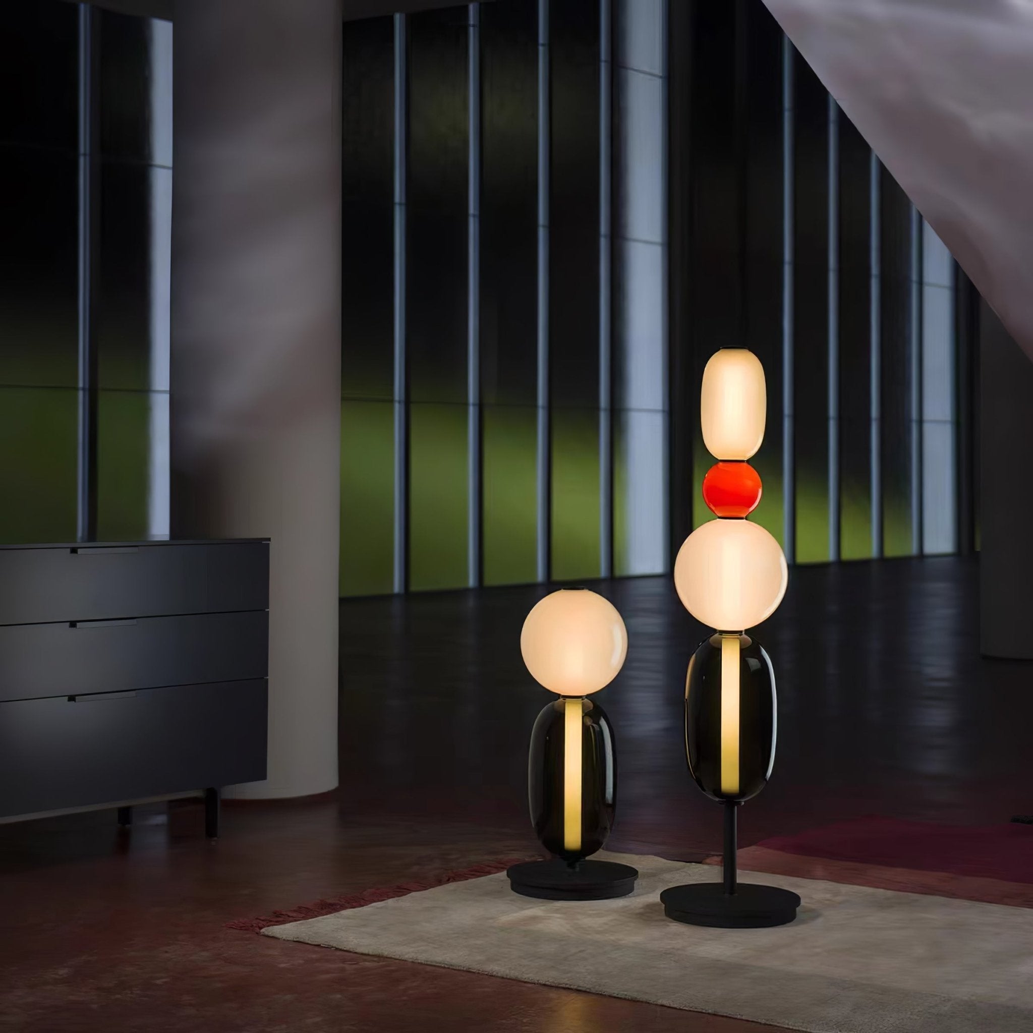 Glass cluster floor lamp glowing in a styled corner setting