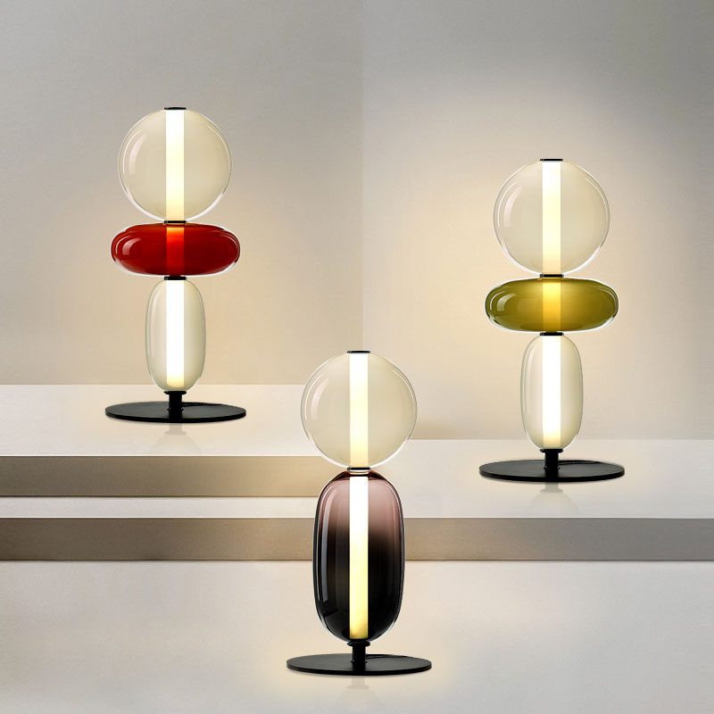 Crystal cluster table lamp on a black base in soft focus
