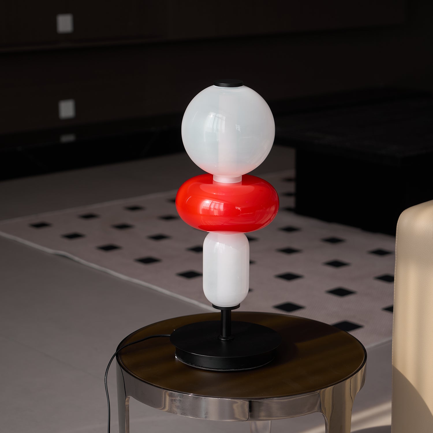 Hand-blown crystal table lamp pebbles catching warm light