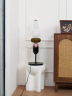 Crystal pebble table lamp lighting a cozy reading nook