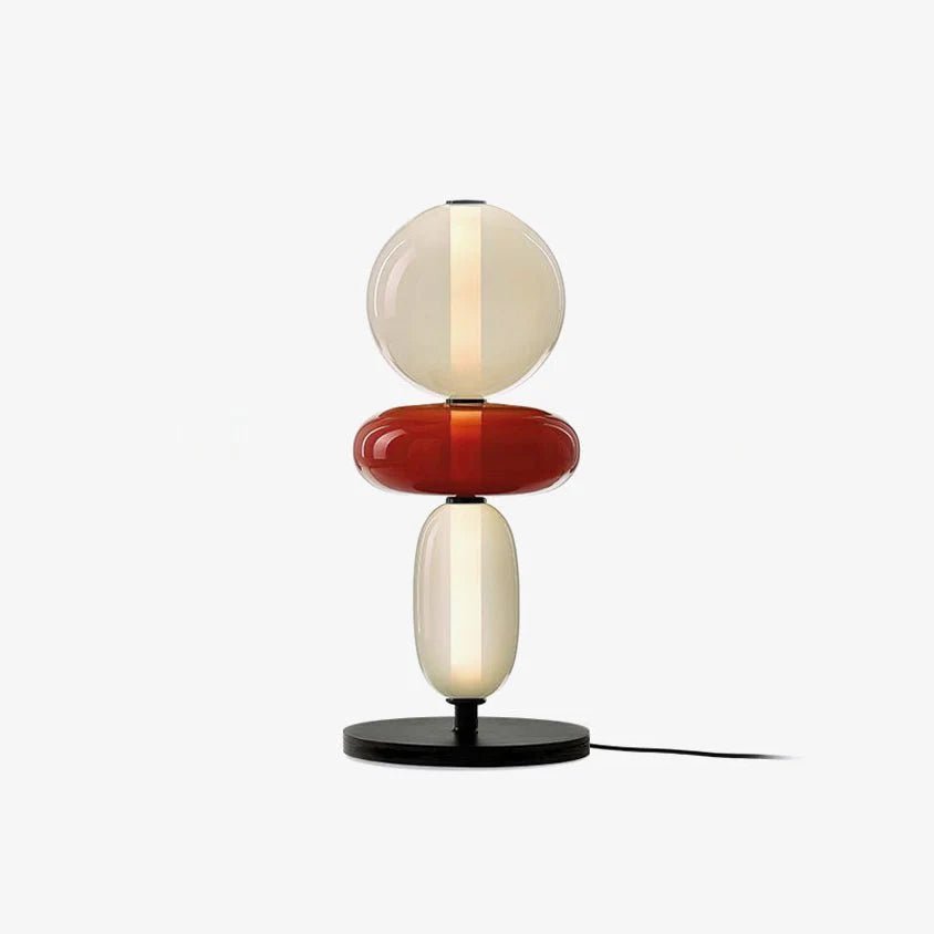 Crystal cluster table lamp with black base lit warmly