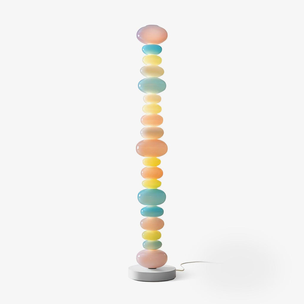 Clérachic multicolour glass globe floor lamp shown unlit on a plain white background, full length with its round base.