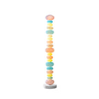 Set against a plain white background, this Clérachic floor lamp displays a slightly different arrangement of glowing globes.
