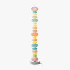 Clérachic glass globe floor lamp shown unlit and centred on a plain white background, its round base facing forward.