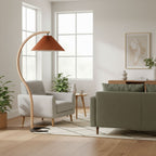 Floor lamp with warm linen shade styled in a modern interior