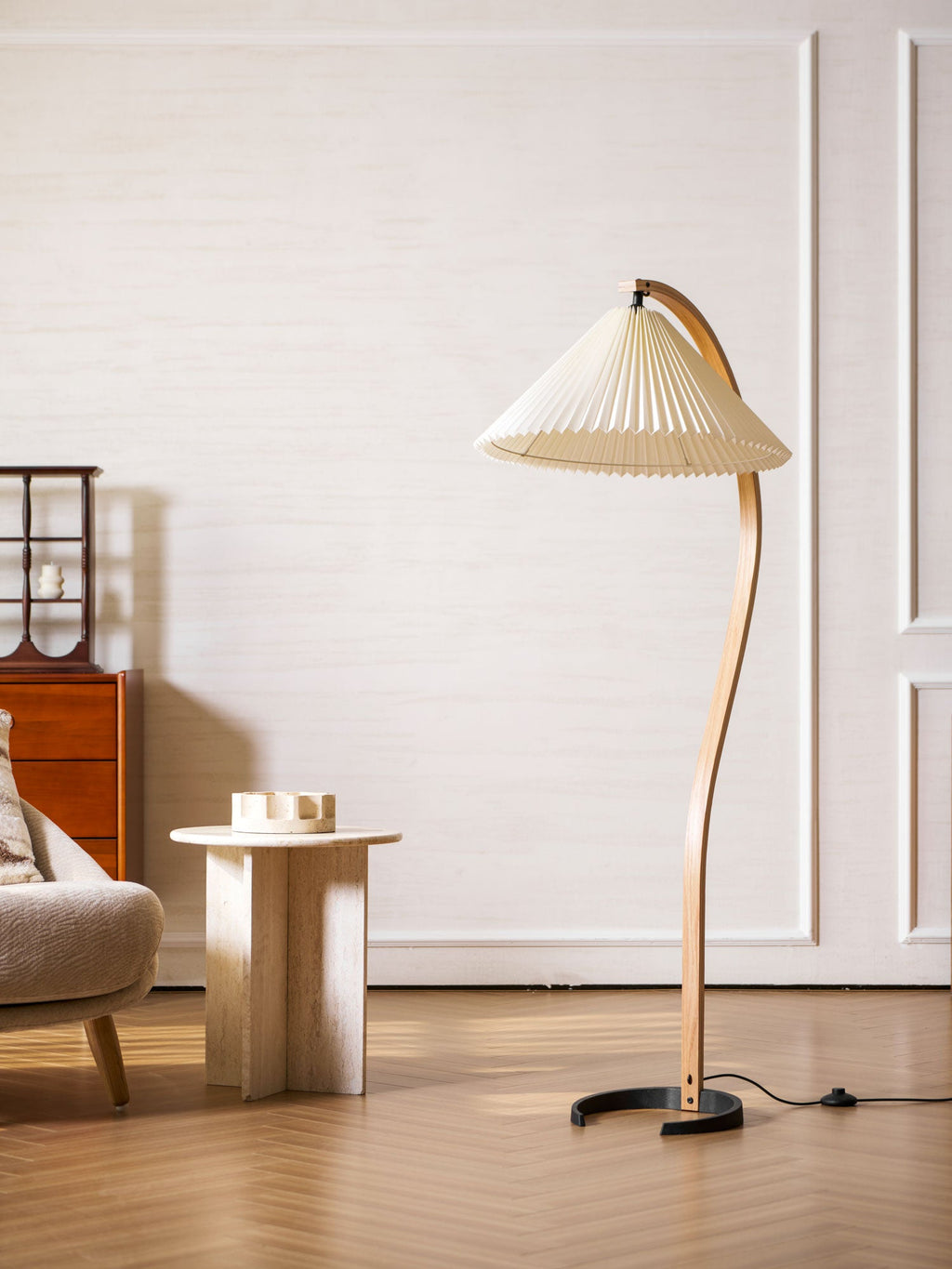 Floor lamp shown at an angle revealing stem and shade proportions