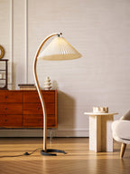Floor lamp detail showing the natural beechwood stem and base