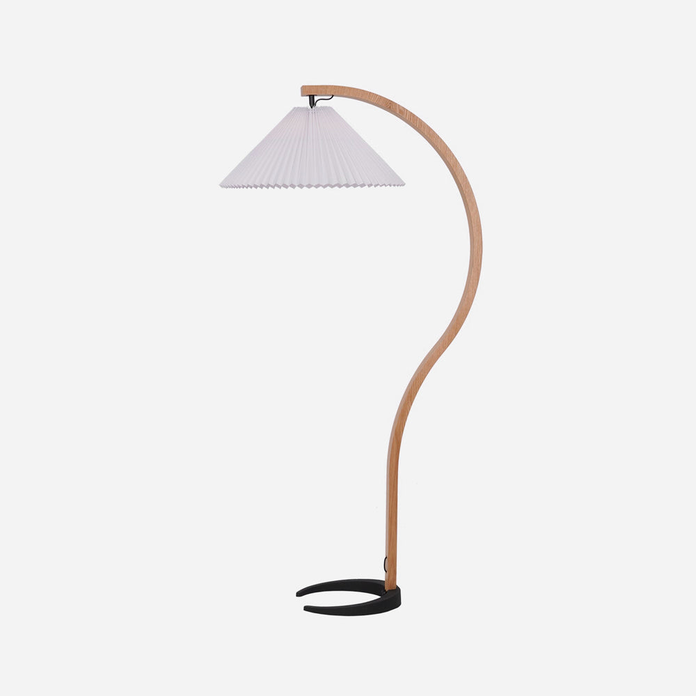 Caprani floor lamp with beechwood stem and linen shade in a styled room