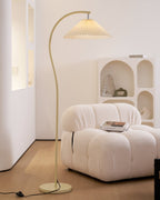 Pleated linen shade of the floor lamp seen from the side