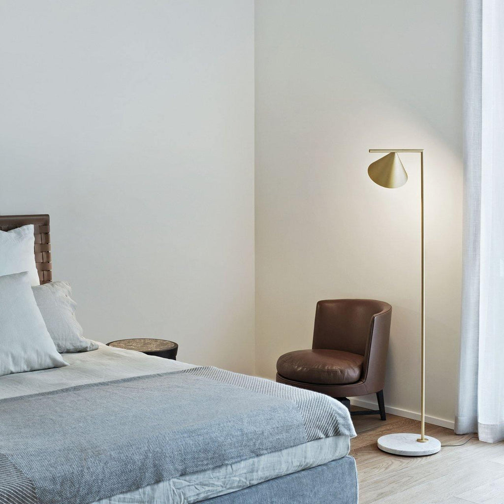 Carrara marble floor lamp glowing softly in an evening room