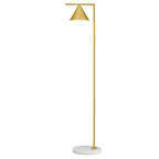 Copper floor lamp with opal cone in a styled living space
