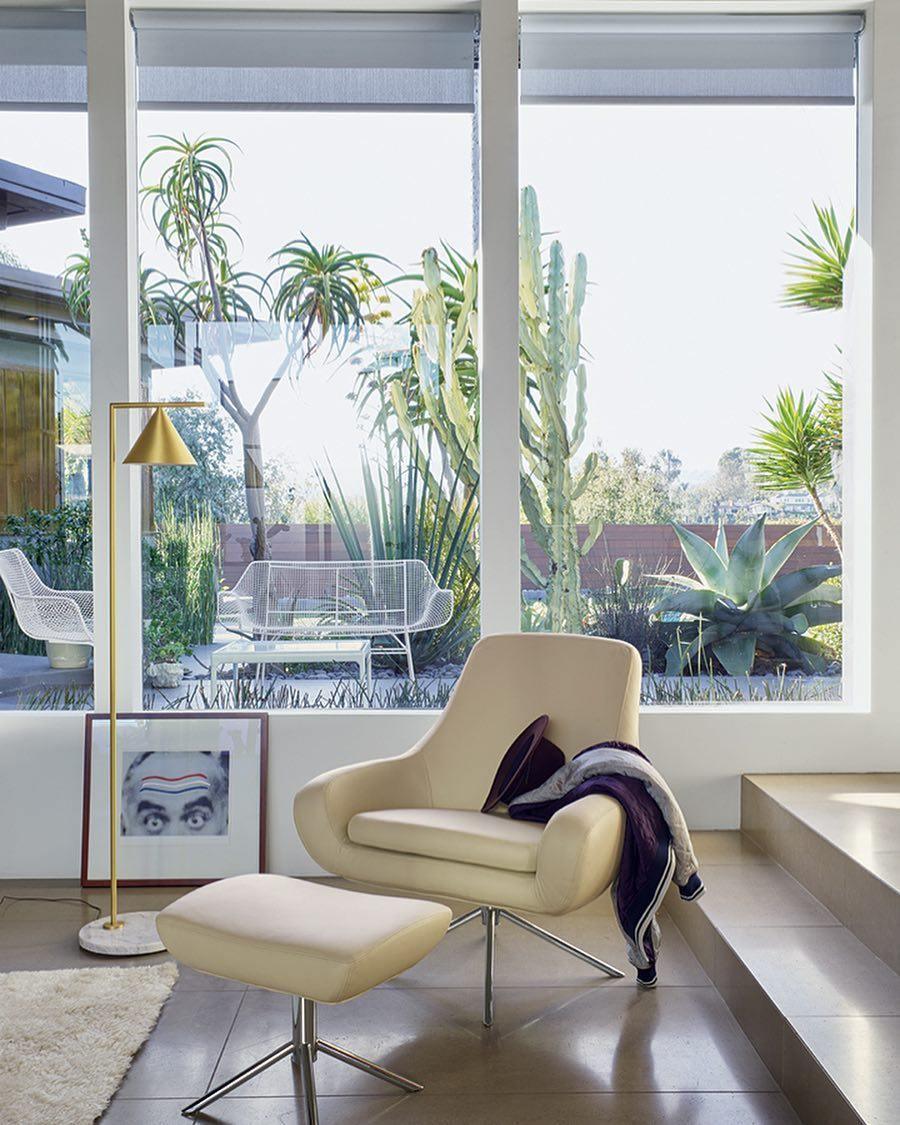 Carrara marble floor lamp standing in a bright interior
