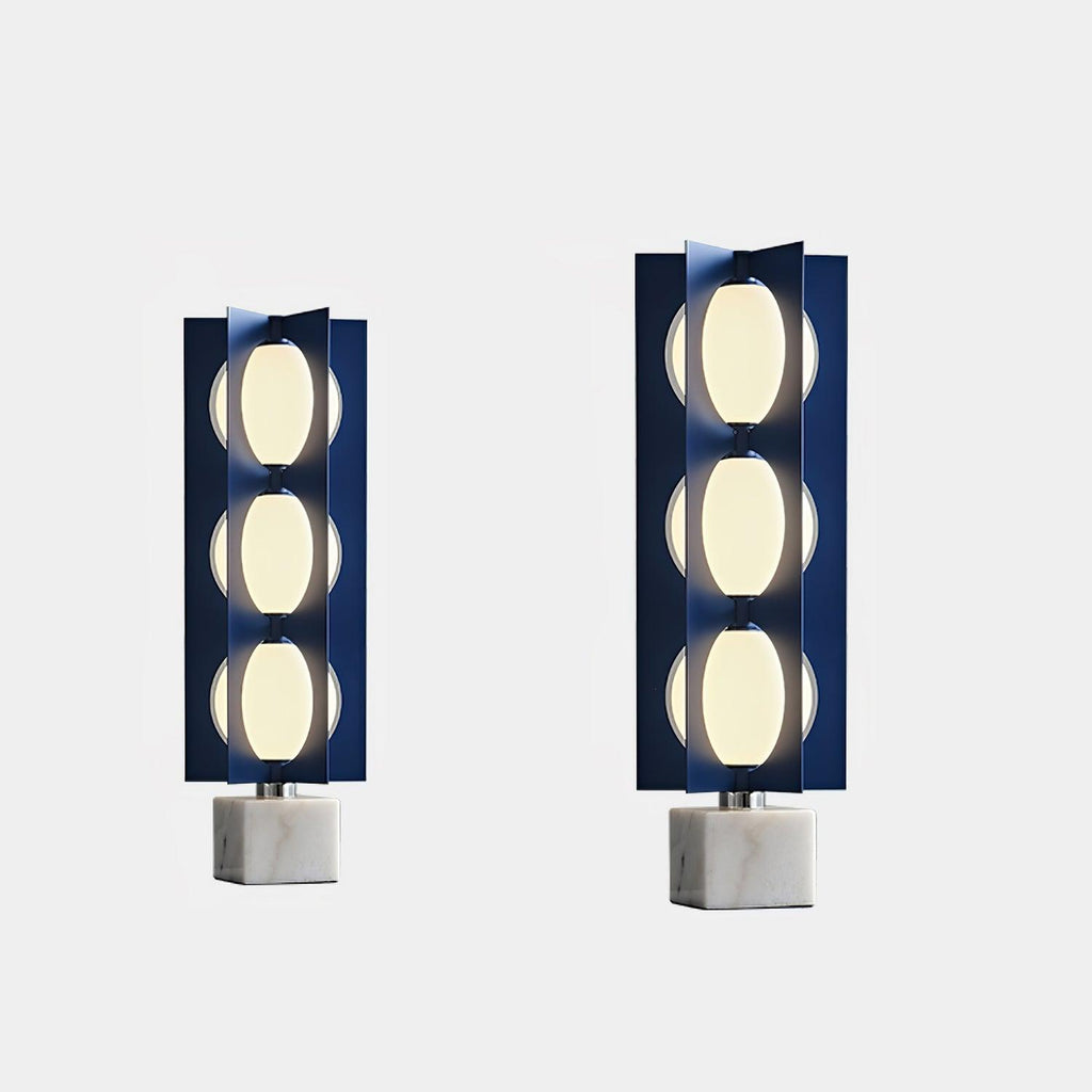 Two Clérachic floor lamps of different heights shown side by side on white marble bases for scale comparison.