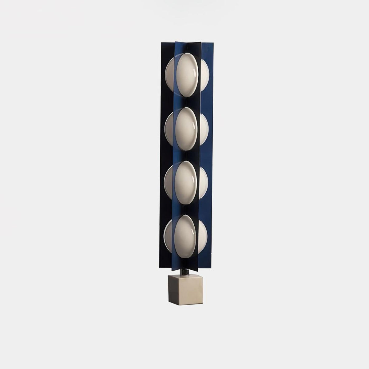 Four-globe Clérachic floor lamp in dark navy on a pale stone base, an isolated product shot on plain white.