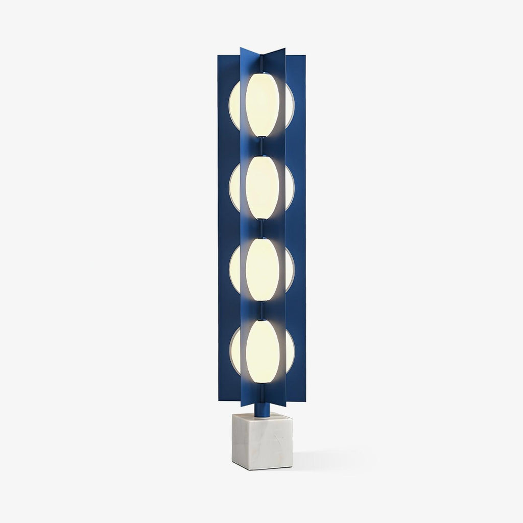 Four-globe Clérachic floor lamp on a pale stone base, photographed unlit against a plain light-grey studio backdrop.