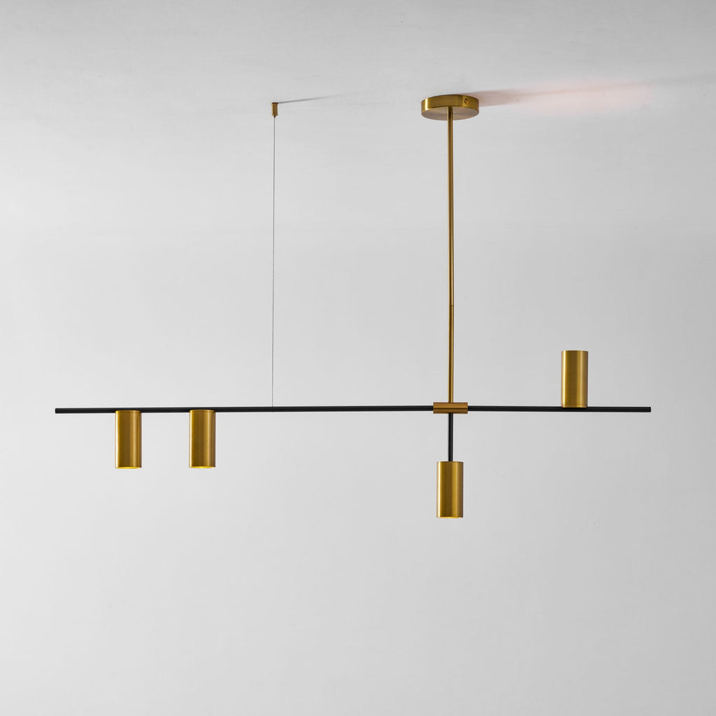 Photographed on a plain white background, this Clérachic chandelier's black bar carries gold heads bunched toward the centre.