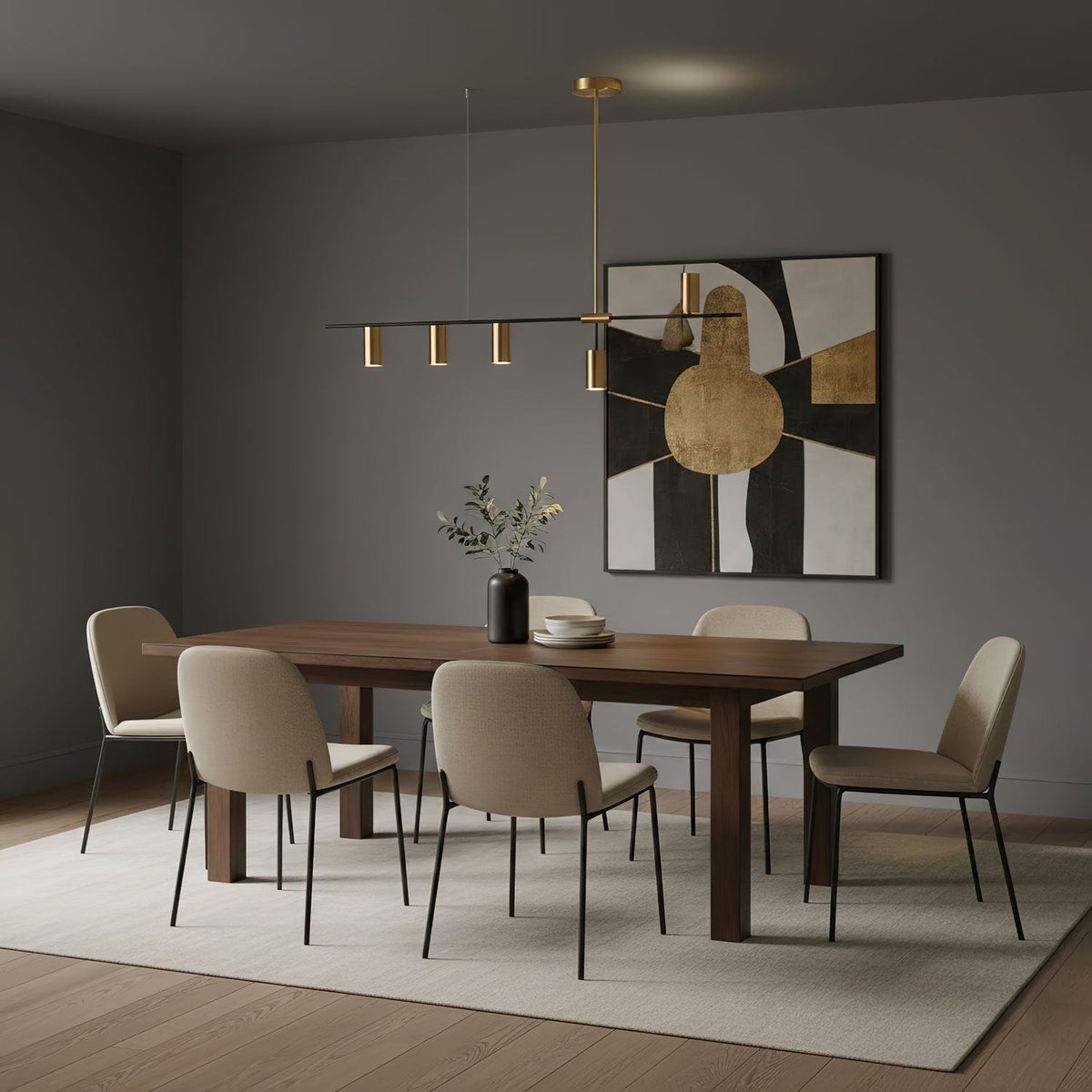This Clérachic chandelier spans a dark grey dining room, its gold heads angled above a walnut table and cream chairs.