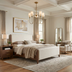 This brass Clérachic chandelier lights a bedroom with a coffered ceiling and a floor-length mirror.