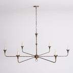 Candle chandelier shown against a plain backdrop