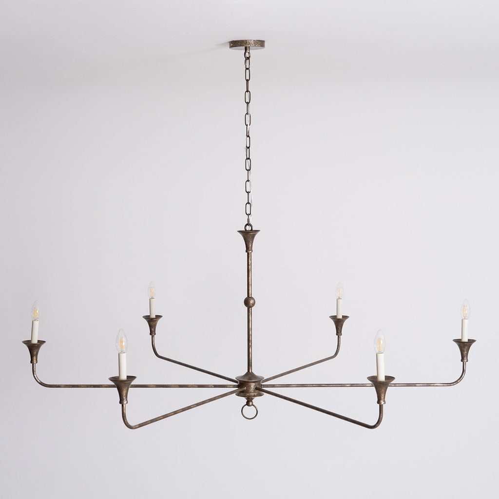 Candle chandelier shown from below with radiating arms
