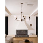 Candle chandelier full view with exposed candle-style bulbs