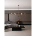 Candle chandelier full fixture view with exposed bulbs