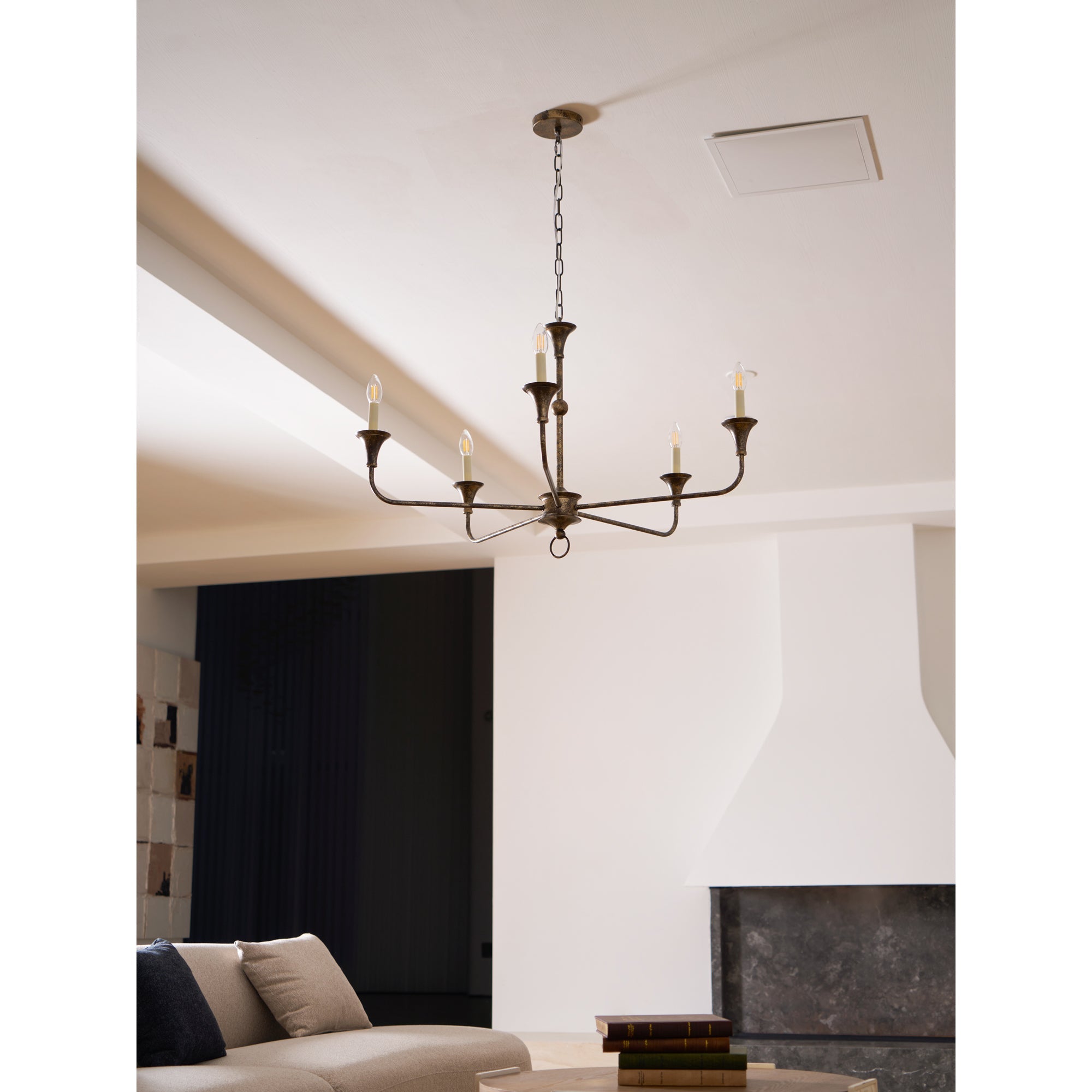 Candle chandelier illuminated with warm candle-style light