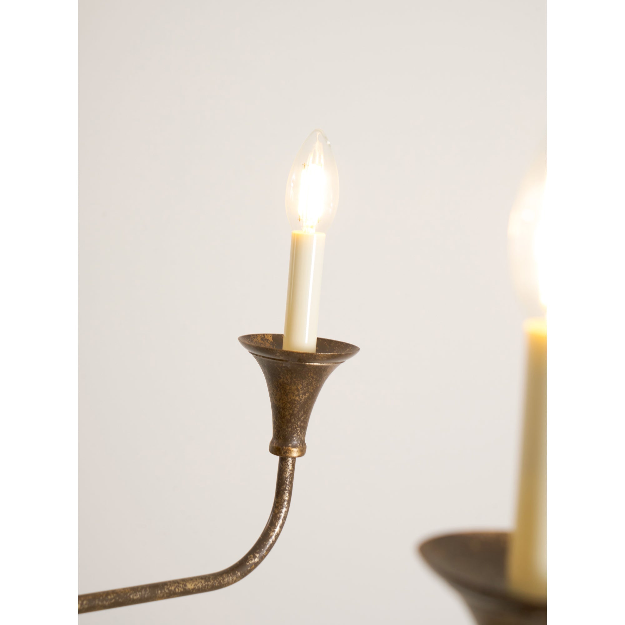 Candle chandelier shown against a plain background to show its full shape