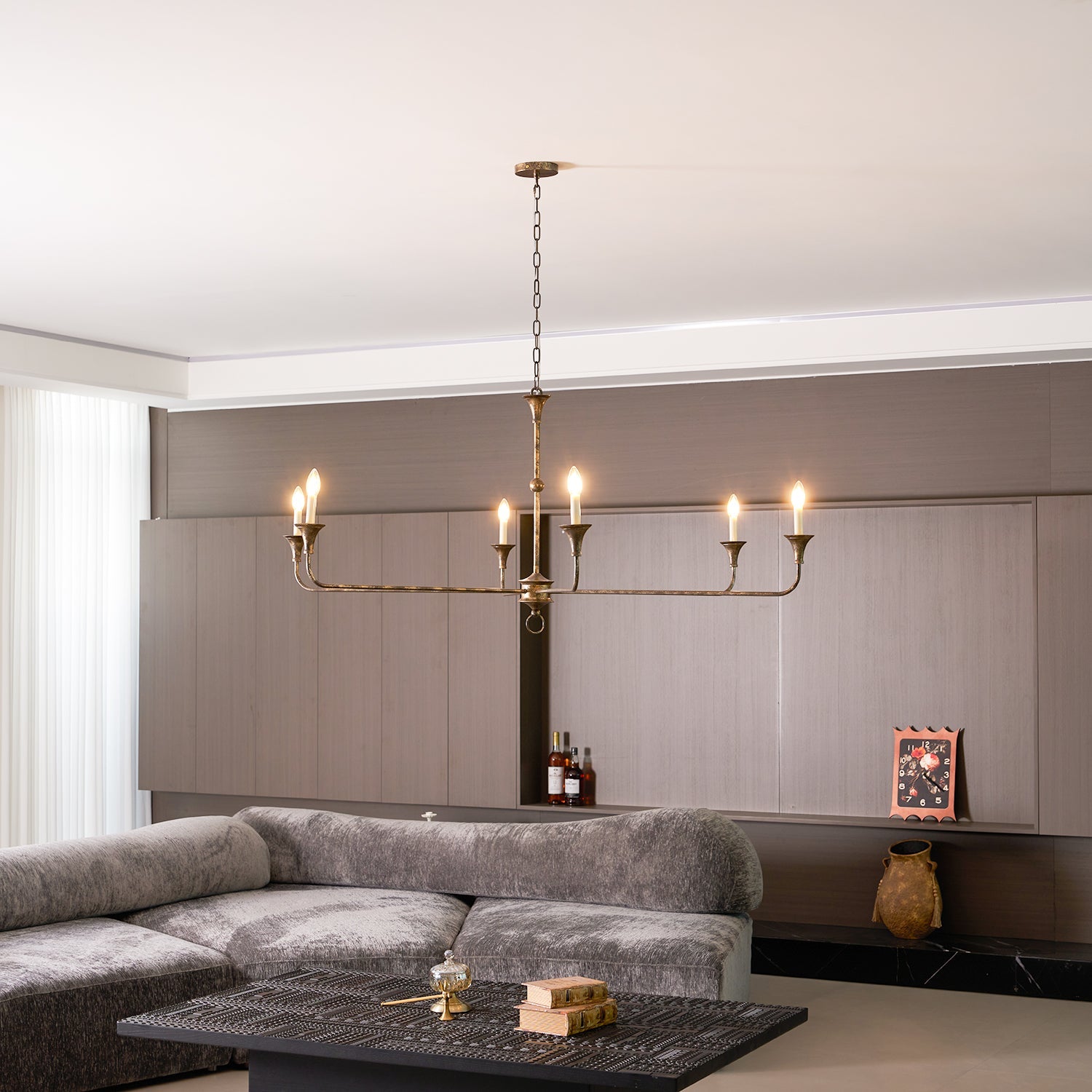 Candle chandelier side profile showing its slender silhouette