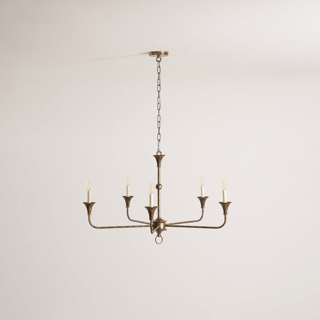 Candle chandelier detail of the central stem and chain