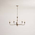 Candle chandelier detail of the central stem and chain
