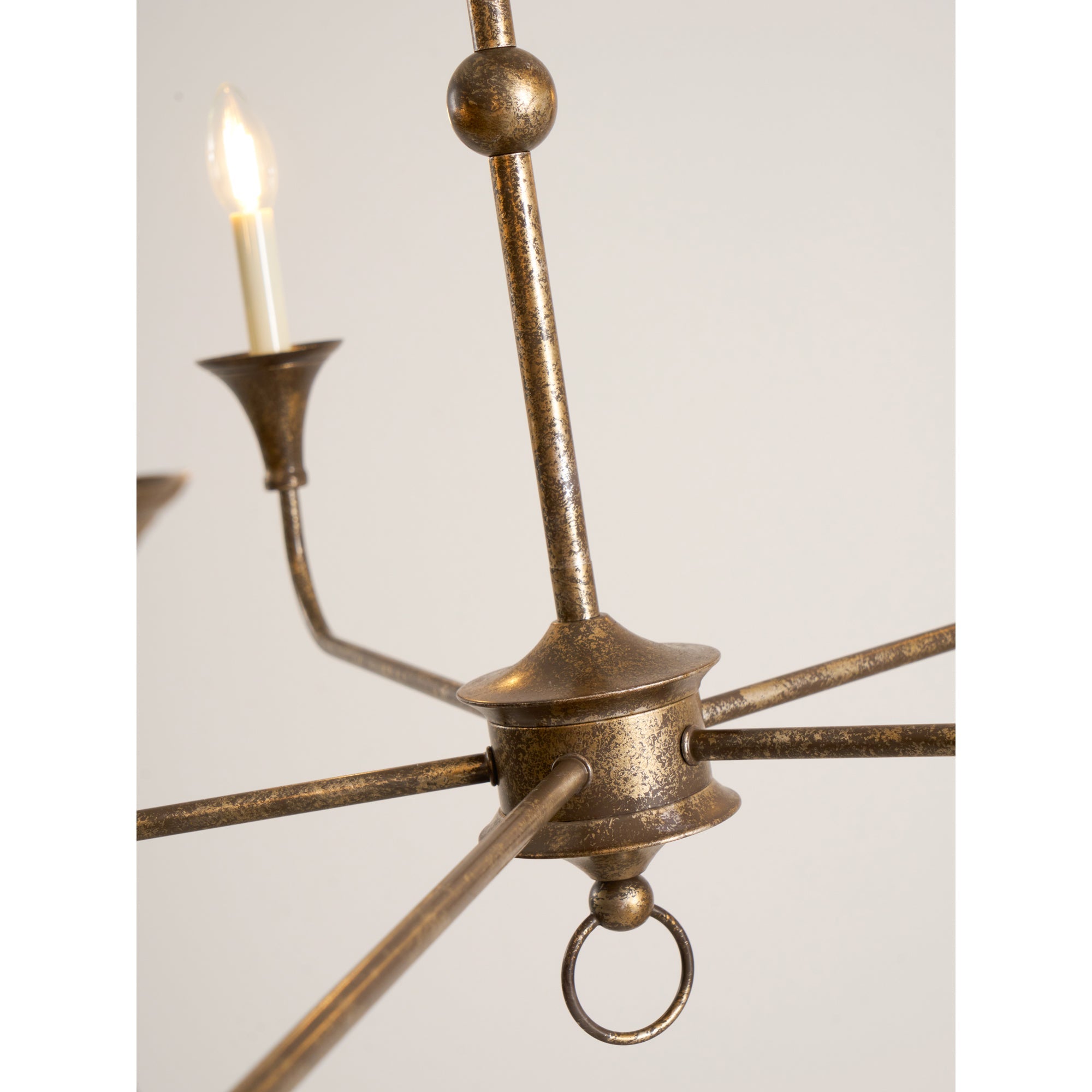 Candle chandelier close-up of arm joint and finish