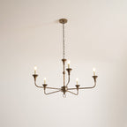 Candle chandelier detail showing exposed candle bulb fittings