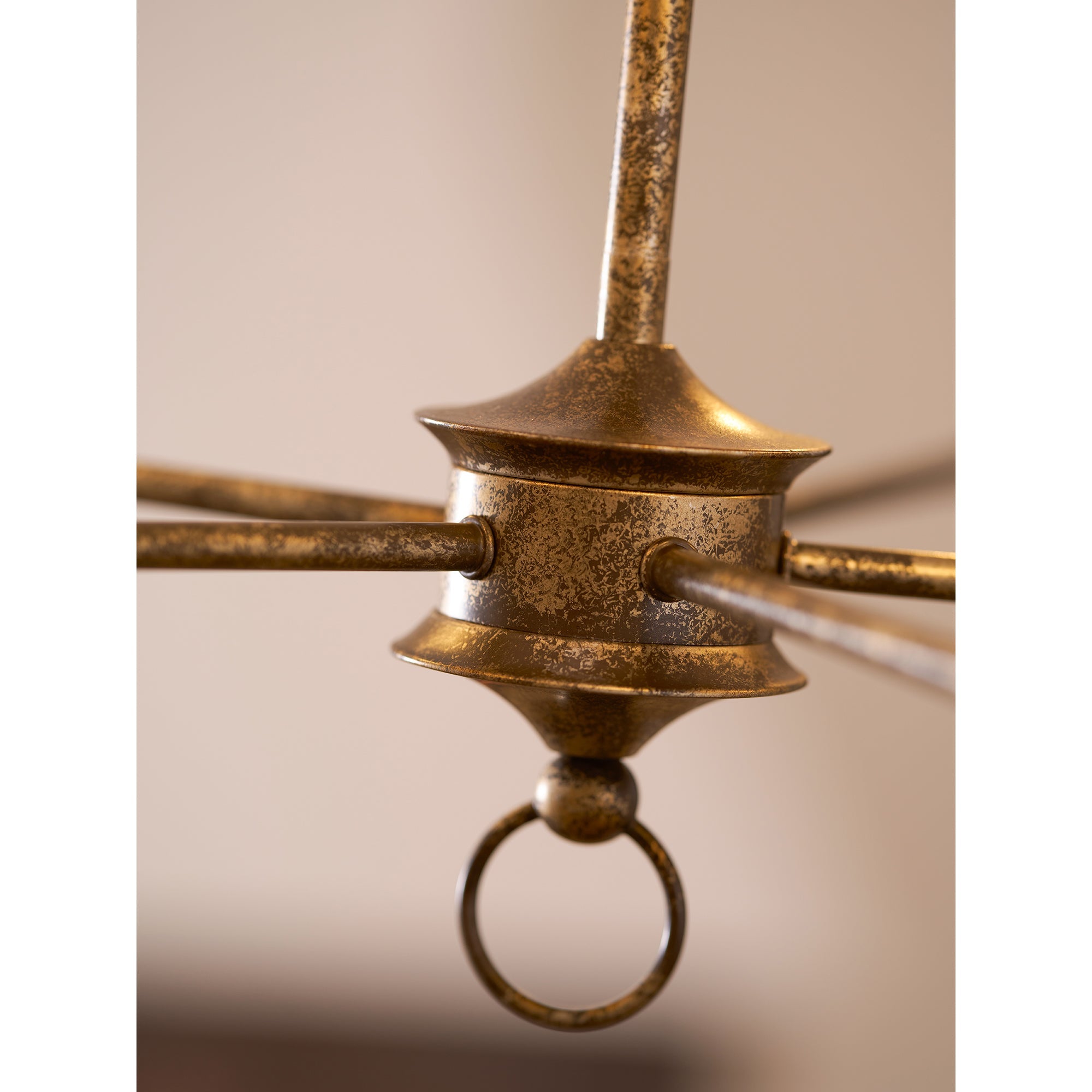 Candle chandelier detail of brass arm and bulb holder
